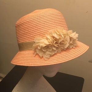 Apricot straw hat with white flower detail